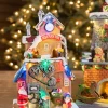 Online Decorator's Warehouse 11.4” H B/O Lighted Musical Santa’s Toy Factory With Moving Train